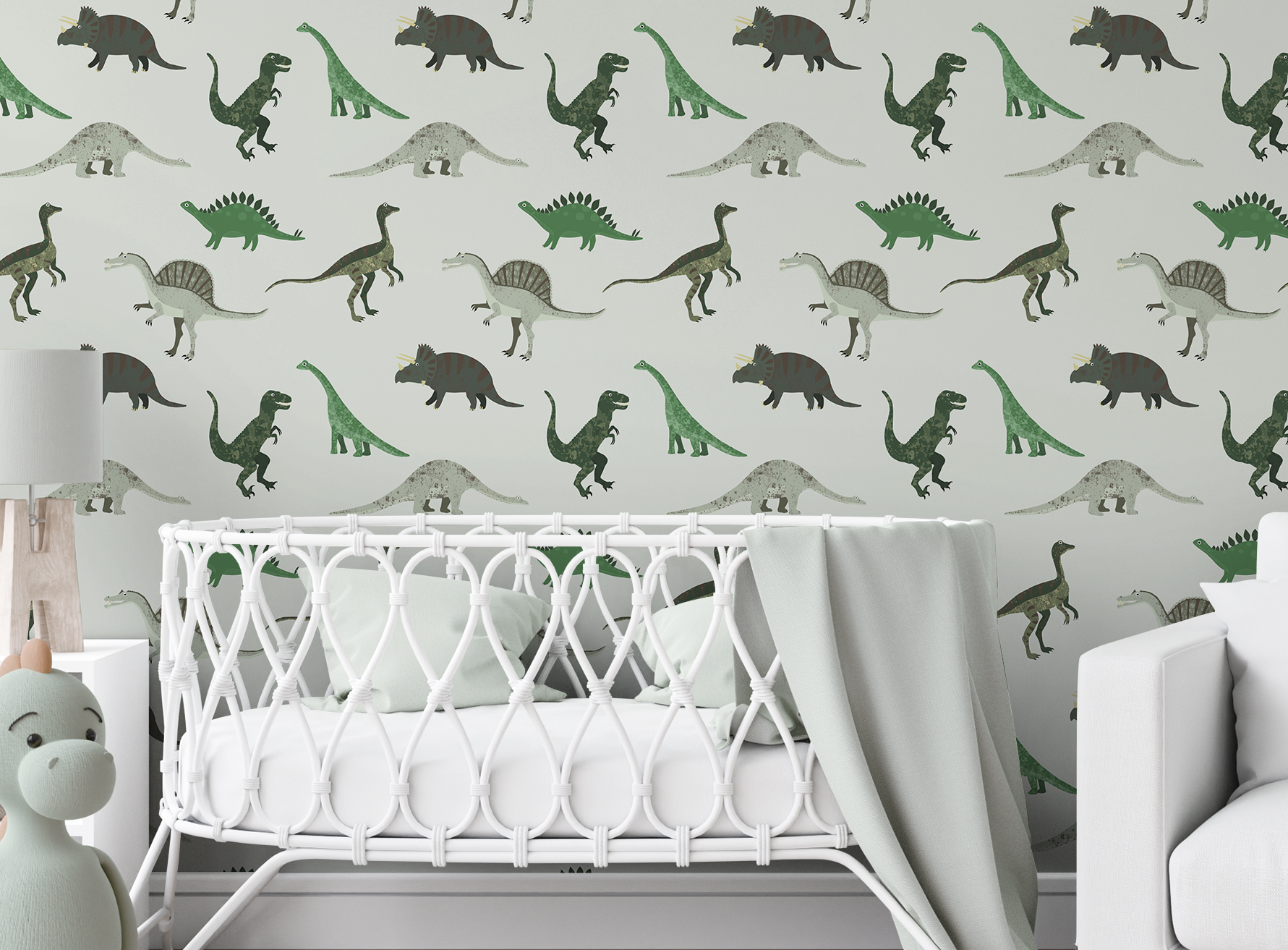 Dinosaurus kamer met dinosaurus behang en rotan wiegje