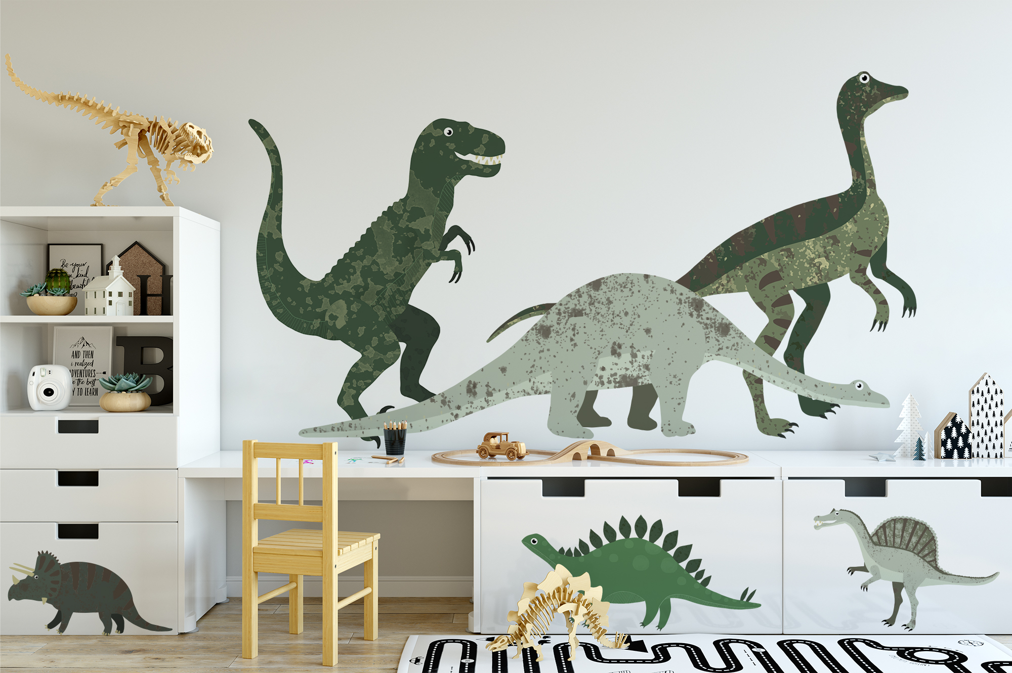 Dinosaurus muurstickers in verschillende formaten op de wand en meubels