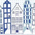Kinderbehang met kleurrijke huizen en katten, speels ontwerp voor kinderkamer.