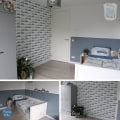 Kinderbehang met auto's in kinderkamer.
