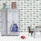Behang, kinderbehang met auto's in groen, zwart en wit.