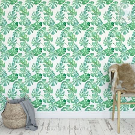 Behang met monstera bladeren, kinderbehang, groen en wit.