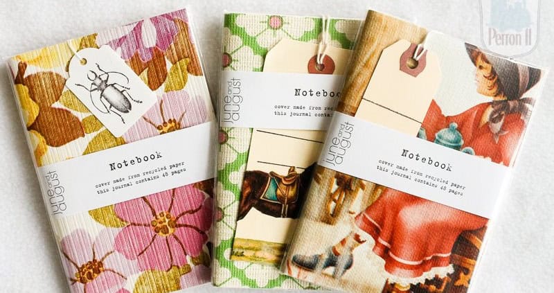 Behang, kinderbehang notitieboekjes met bloemen en dieren.