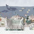 Kinderbehang met onderwaterwereld en zeedieren.