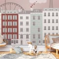 Kinderbehang met stadsgezicht en attracties.