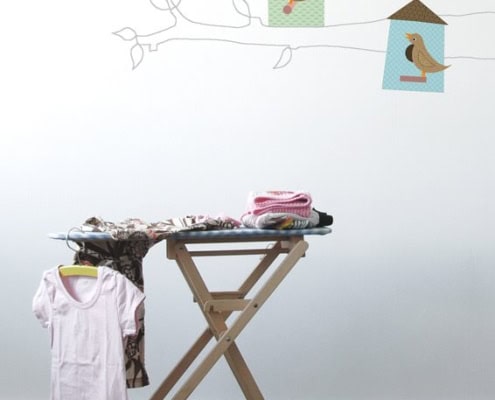 Behang, kinderbehang met vogels en huisjes voor kinderkamer.