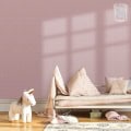 Behang, kinderbehang met zonnetjes en zachte kleuren.