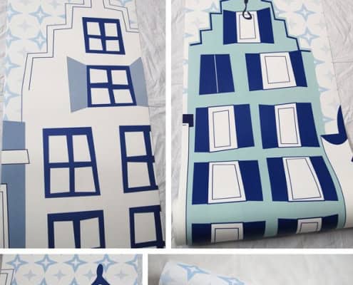 Behang, kinderbehang met blauwe huizen en sterren.