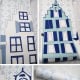 Behang, kinderbehang met blauwe huizen en sterren.