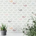 Behang met walvissen, kinderbehang, zacht pastelkleuren.