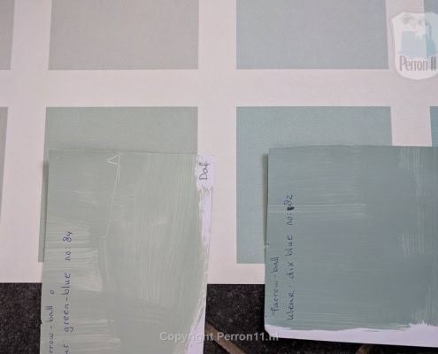 Behang, kinderbehang met verfkleuren in blauw en groen.