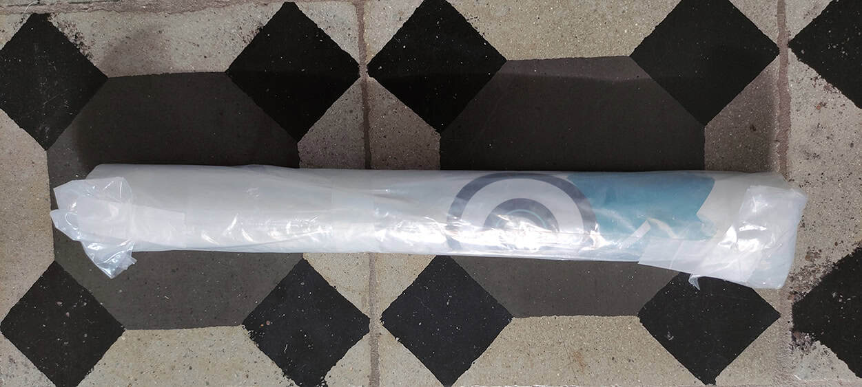 Behang, kinderbehang, rol in plastic verpakking.