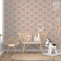 Behang, kinderbehang met bloemenpatroon in pastelkleuren.