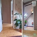 Behang, kinderbehang met geometrisch patroon in rood en zwart.